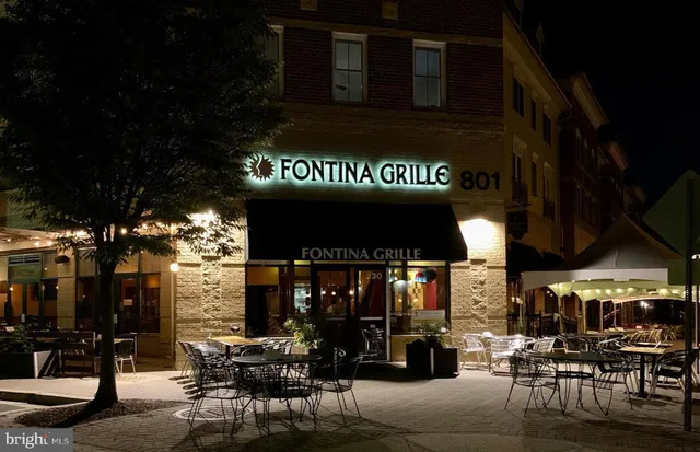 a view of a park with swings and slides