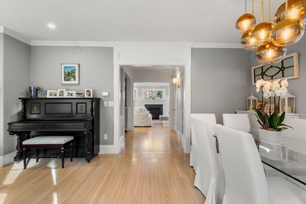 63 Nehoiden Road Newton, MA 02468 - Photo 7 of 22 a view of a livingroom with furniture and a fireplace