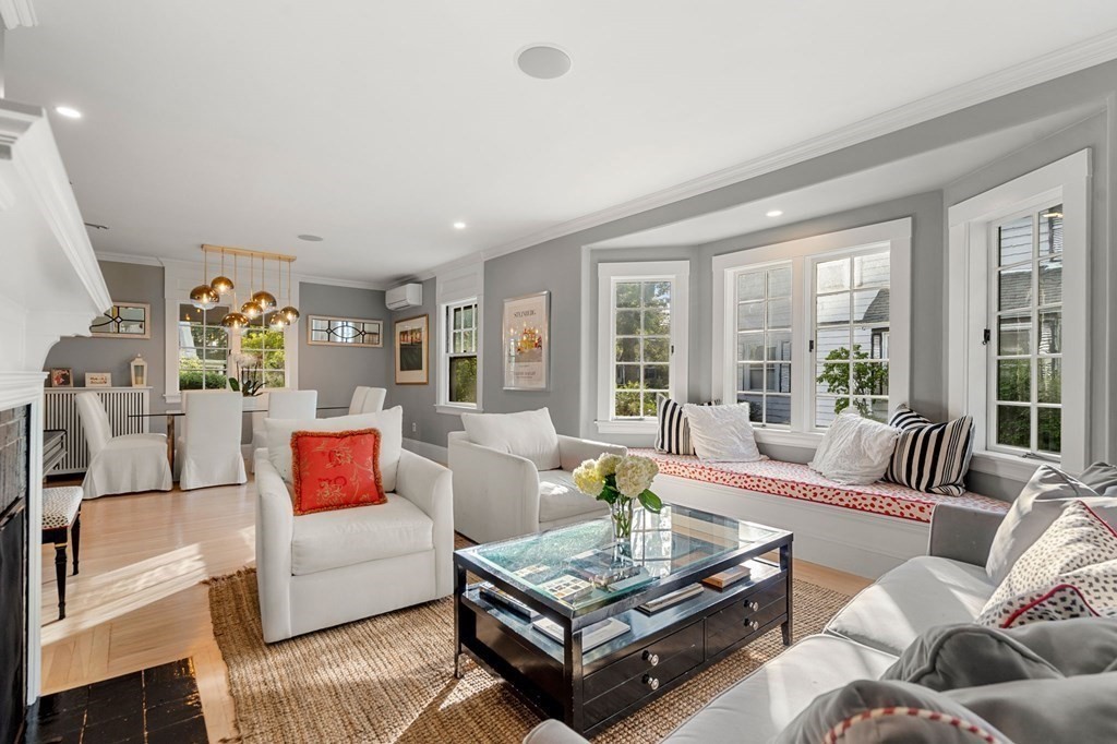 63 Nehoiden Road Newton, MA 02468 - Photo 10 of 22 a living room with furniture and a large window