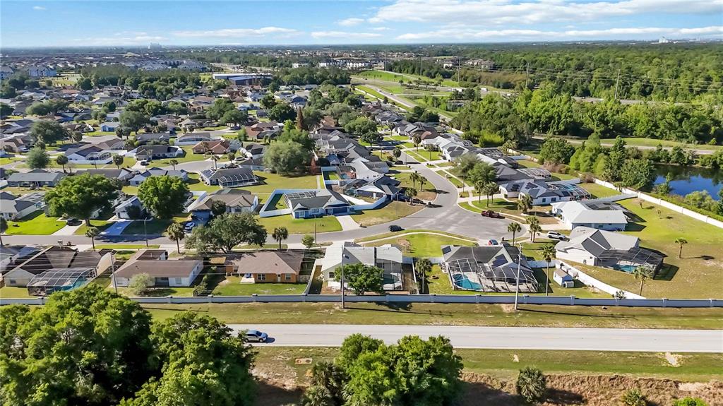 7771 Indian Ridge Trail North Kissimmee, FL 34747 - Photo 39 of 51 an aerial view of residential building and lake