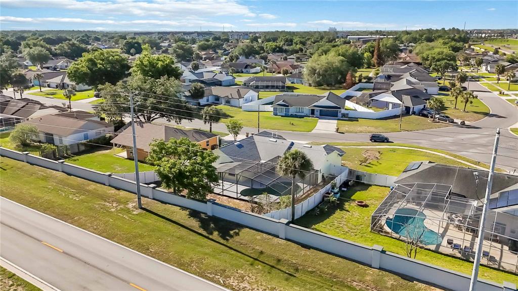 7771 Indian Ridge Trail North Kissimmee, FL 34747 - Photo 41 of 51 a view of a swimming pool with outdoor seating
