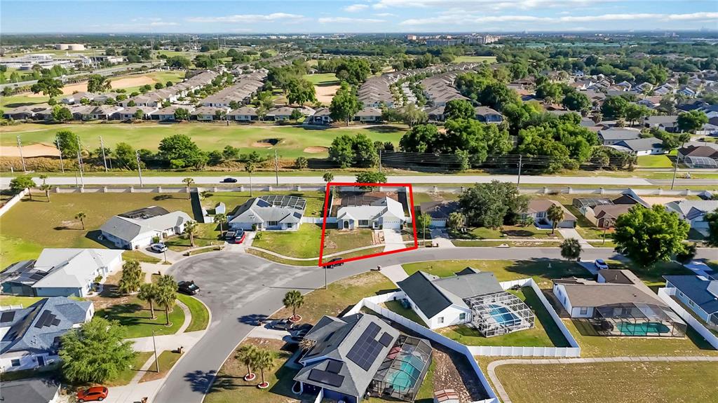 7771 Indian Ridge Trail North Kissimmee, FL 34747 - Photo 44 of 51 an aerial view of a house with outdoor space