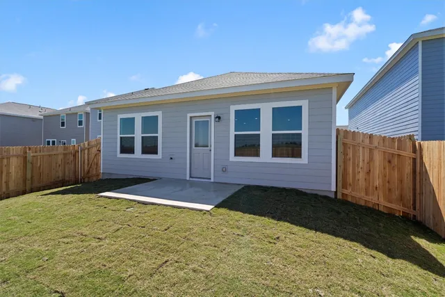 a front view of a house having yard