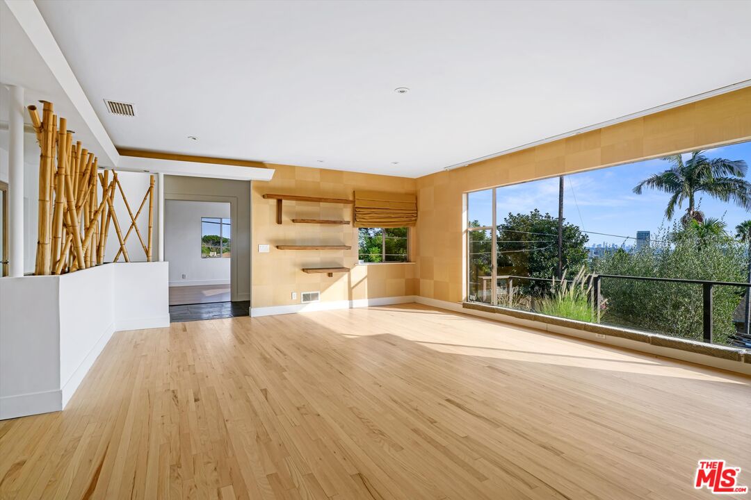 211 Cumberland Road Glendale, CA 91202 - Photo 12 of 48 a bedroom with a bed and a large window