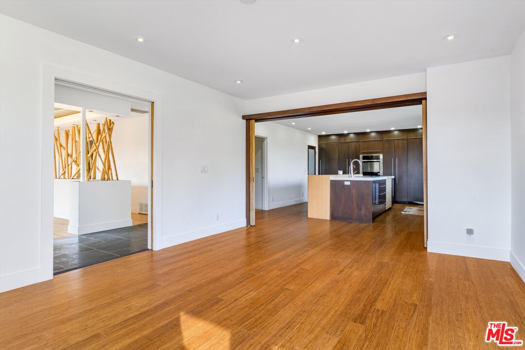 211 Cumberland Road Glendale, CA 91202 - Photo 15 of 48 a view of a room with wooden floor and a cabinet