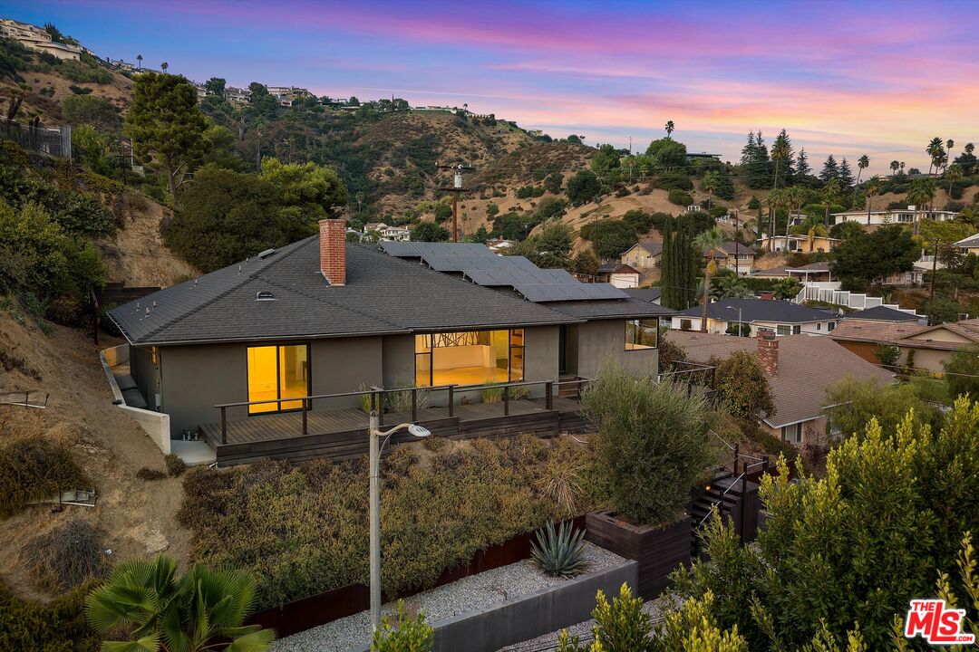 211 Cumberland Road Glendale, CA 91202 - Photo 3 of 48 a front view of a house with a yard