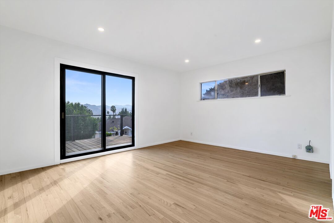211 Cumberland Road Glendale, CA 91202 - Photo 31 of 48 a view of an empty room with glass door