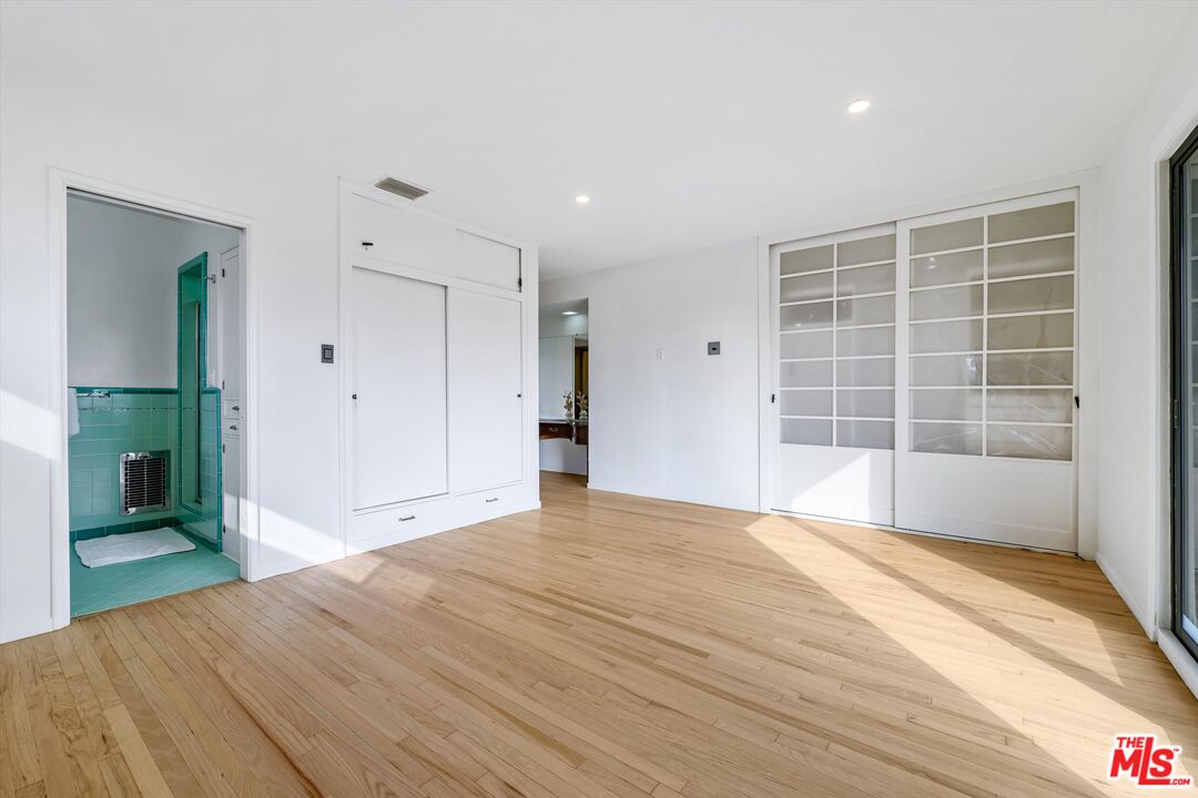 211 Cumberland Road Glendale, CA 91202 - Photo 32 of 48 a view of empty room with wooden floor and fan
