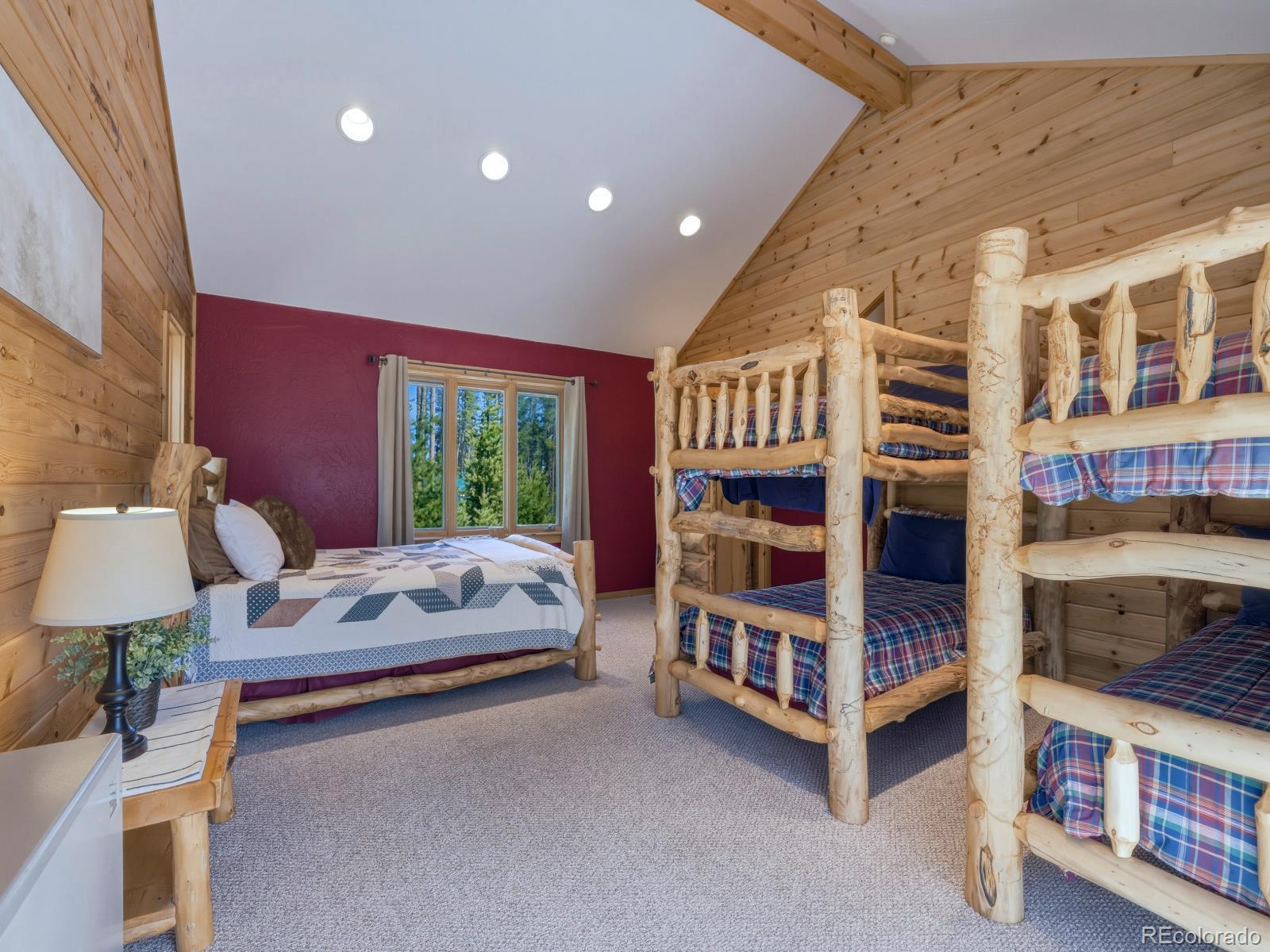 341 Anderson Road Walden, CO 80480 - Photo 10 of 50 a bedroom with bed and a bookshelf