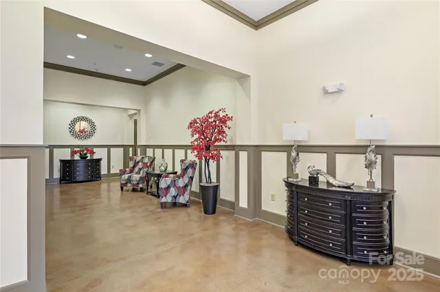 a bed room with furniture and a lamp