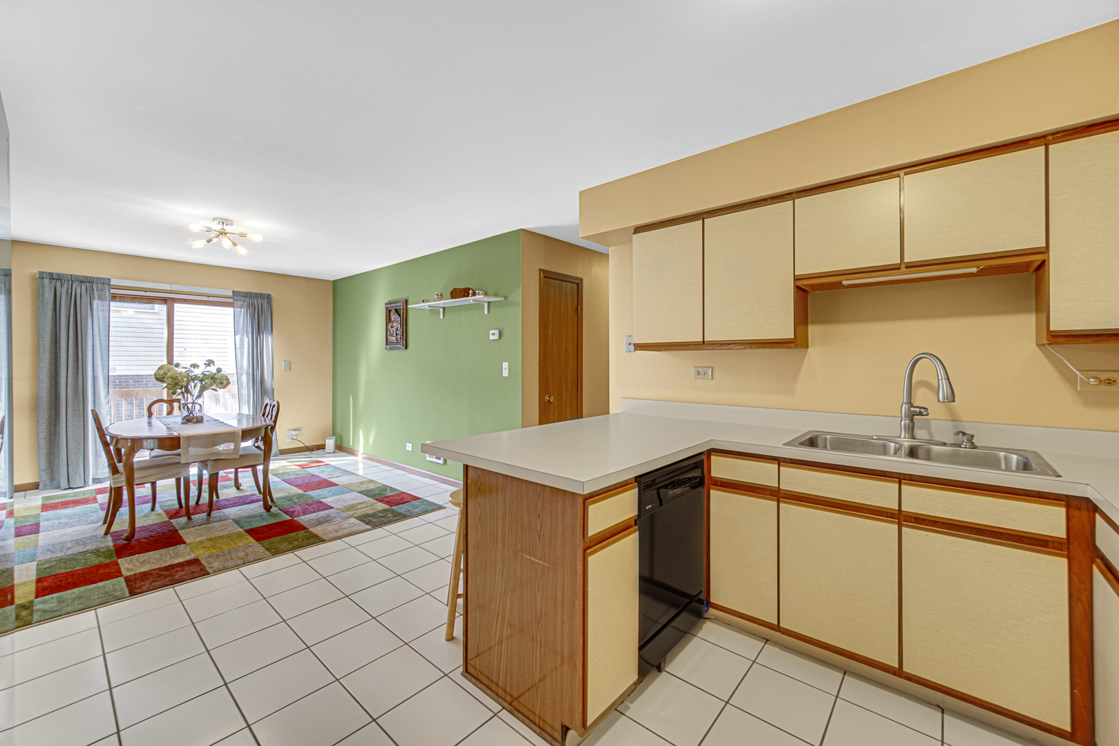 316 Morningside Drive, Unit A Bloomingdale, IL 60108 - Photo 13 of 35 a kitchen with a sink and cabinets