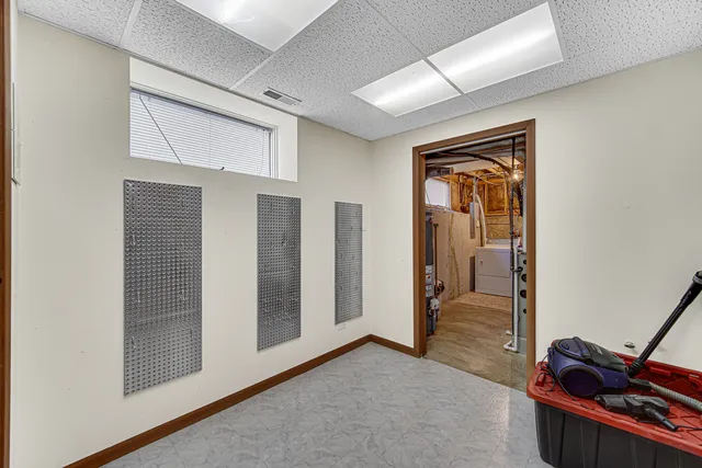 a view of a hallway with workspace