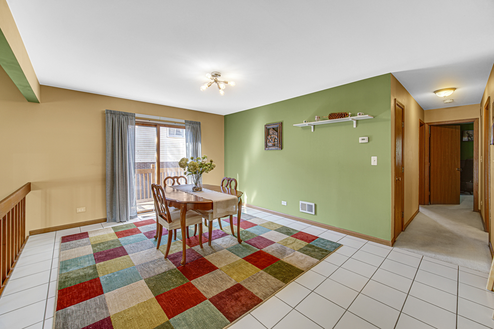 316 Morningside Drive, Unit A Bloomingdale, IL 60108 - Photo 8 of 35 a view of a dining room with a table and chairs