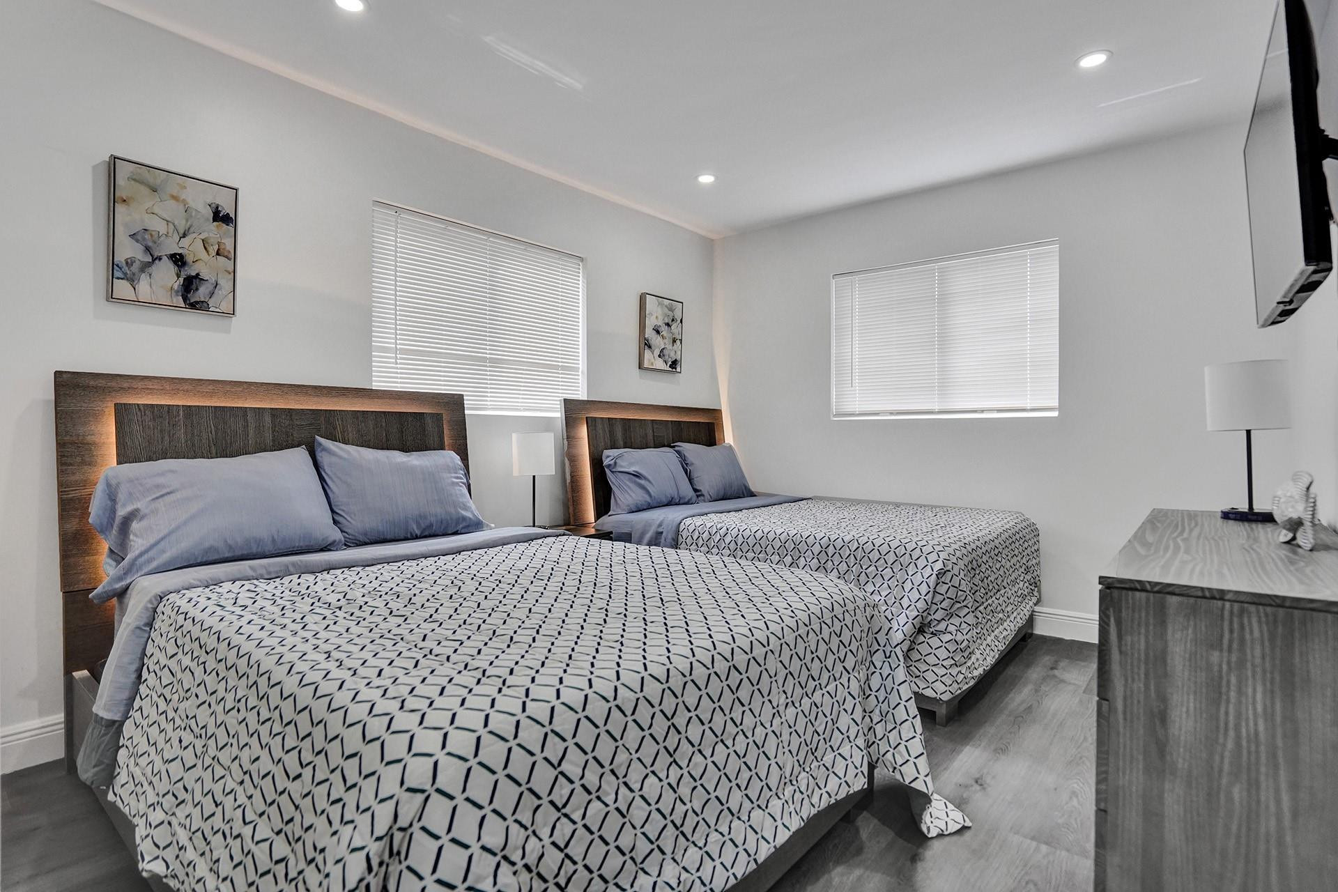 2114 North 42nd Avenue Hollywood, FL 33021 - Photo 18 of 24 a bedroom with bed and window