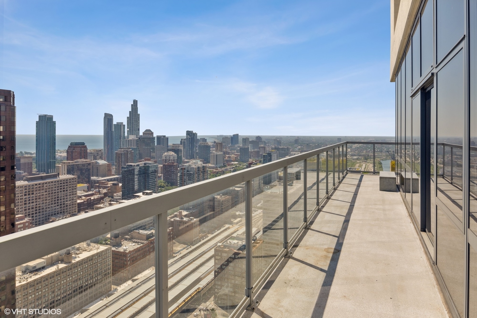235 West Van Buren Street, Unit 4602 Chicago, IL 60607 - Photo 3 of 25 a view of balcony with furniture