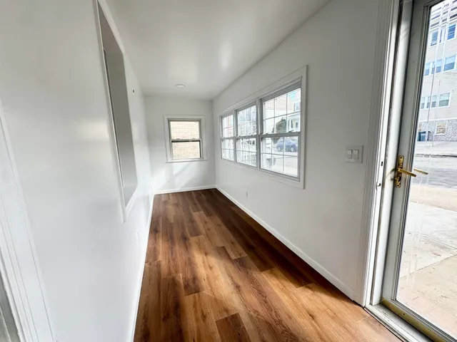 a view of hallway with a window