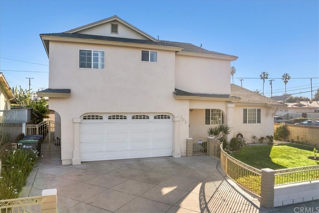 302 East 213th Street Carson, CA 90745 - Photo 1 of 41 a view of a house with a outdoor space
