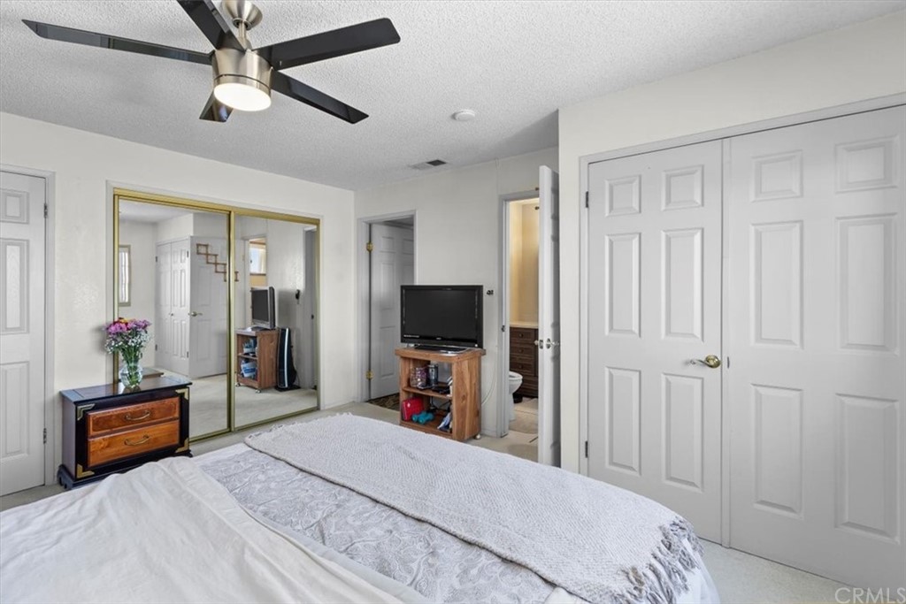 302 East 213th Street Carson, CA 90745 - Photo 22 of 41 a bed room with a bed and a television