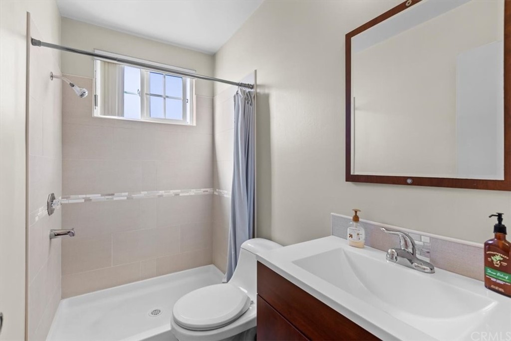 302 East 213th Street Carson, CA 90745 - Photo 36 of 41 a bathroom with a sink toilet and shower