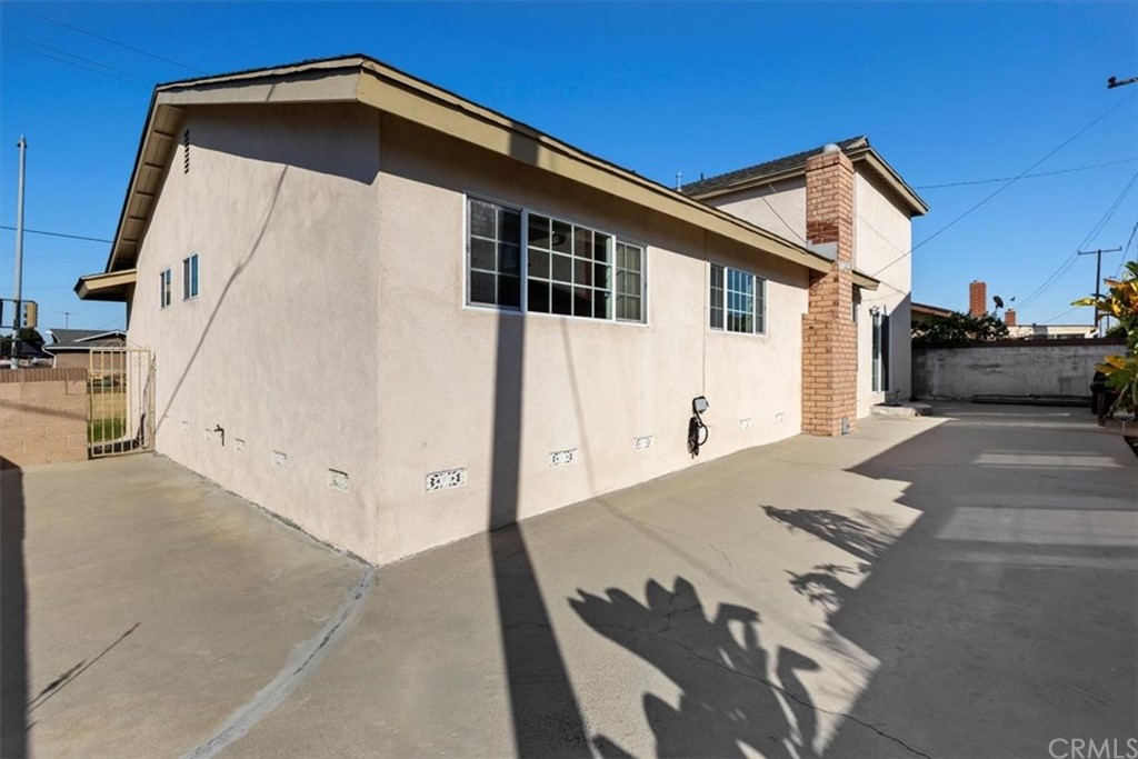 302 East 213th Street Carson, CA 90745 - Photo 38 of 41 a front view of a house with garage
