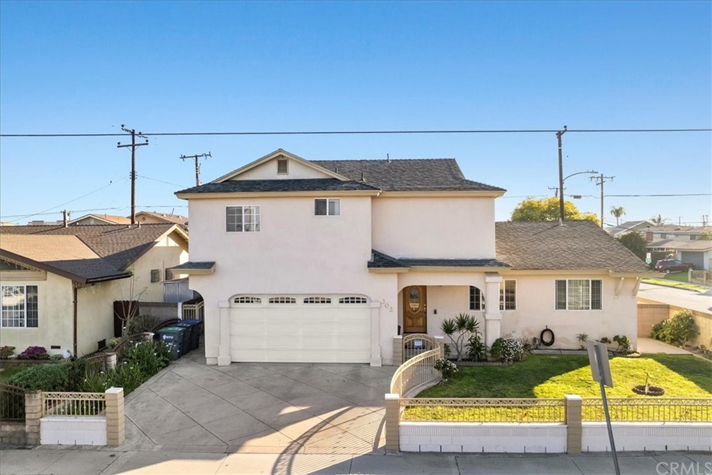 302 East 213th Street Carson, CA 90745 - Photo 39 of 41 a view of a house with pool and chairs