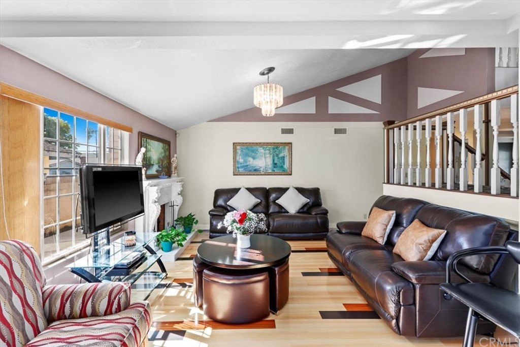 302 East 213th Street Carson, CA 90745 - Photo 5 of 41 a living room with furniture and a flat screen tv