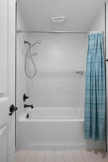 a bathroom with a bathtub