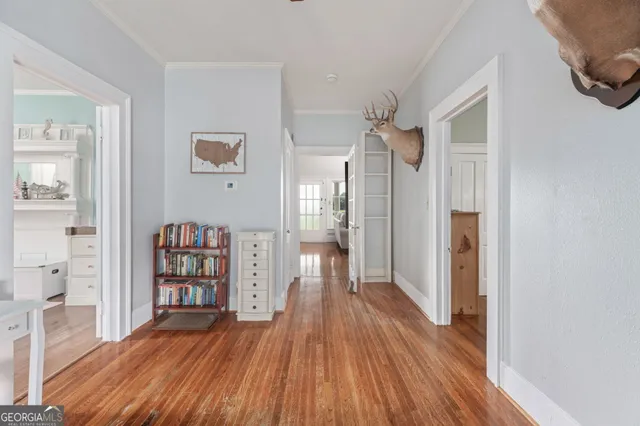 a kitchen with stainless steel appliances a stove sink and microwave