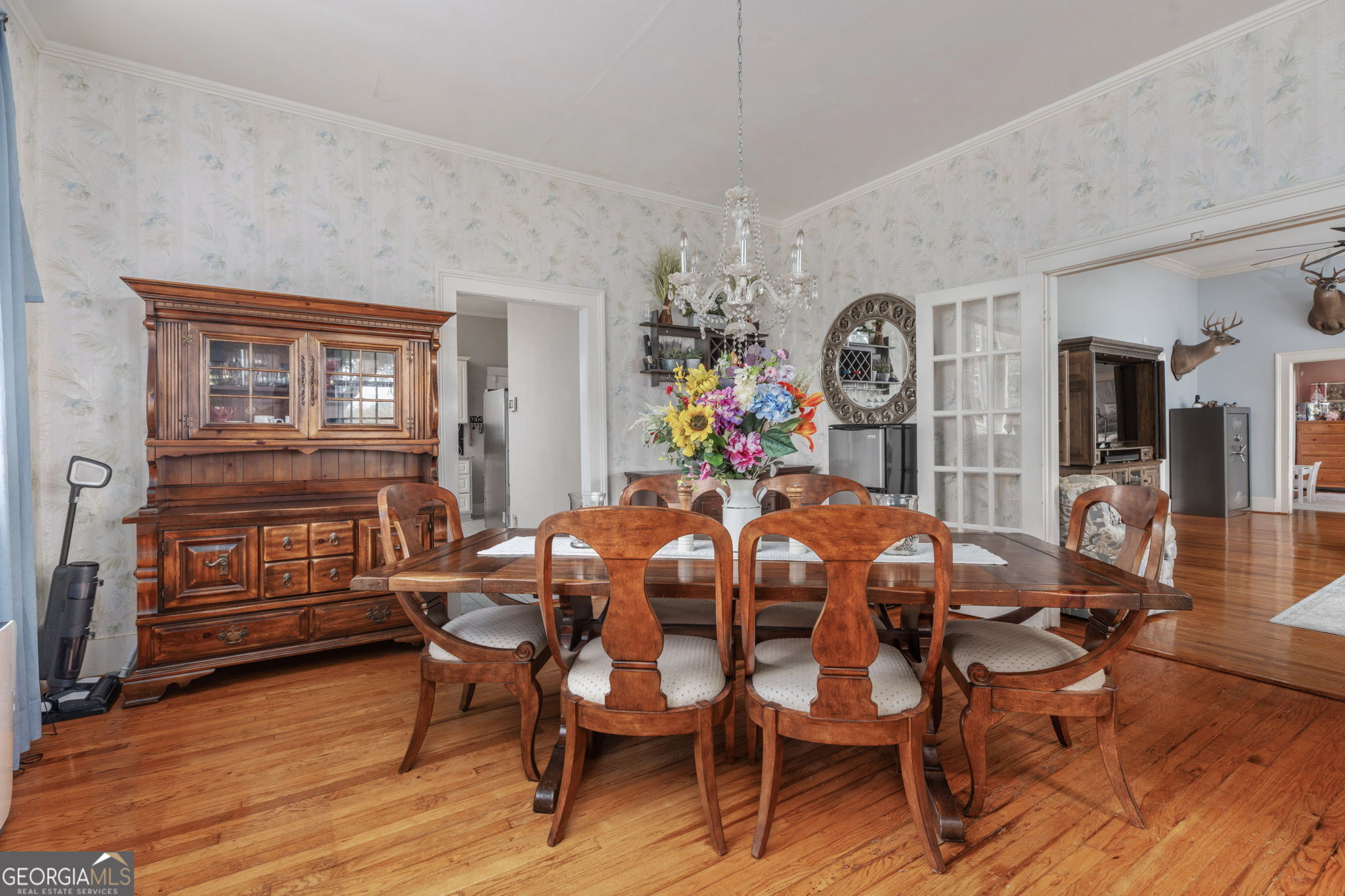 7890 Poplar Springs Road Byromville, GA 31007 - Photo 15 of 74 a view of a dining room with furniture window and wooden floor