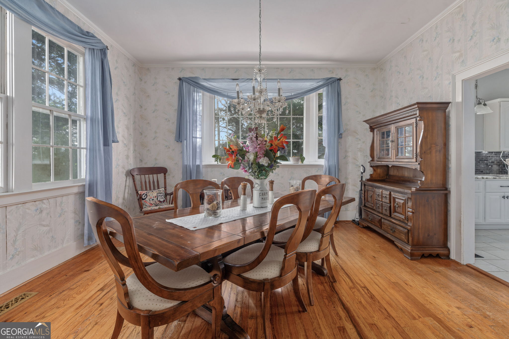 7890 Poplar Springs Road Byromville, GA 31007 - Photo 16 of 74 a view of a dining room with furniture window and wooden floor