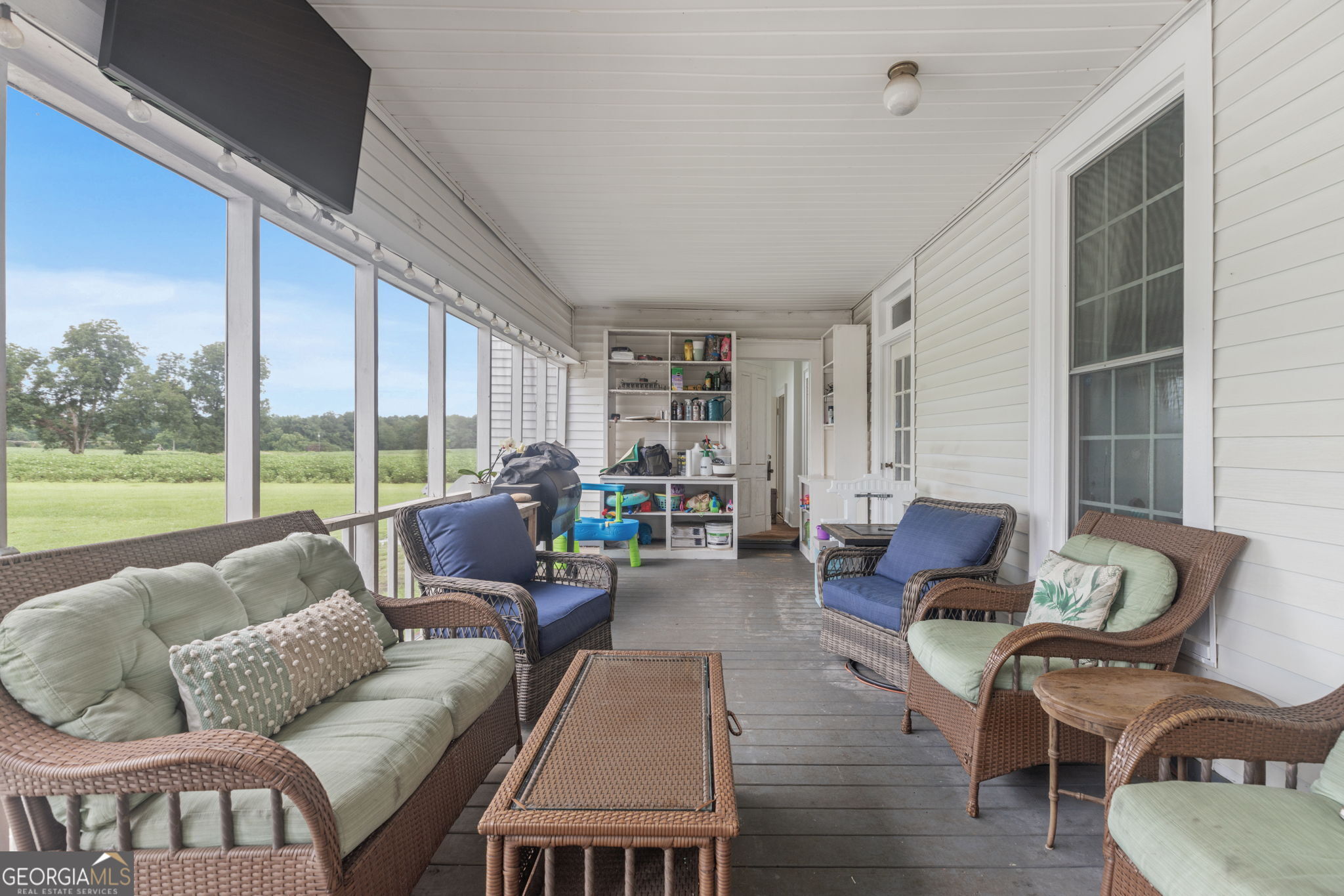 7890 Poplar Springs Road Byromville, GA 31007 - Photo 20 of 74 a living room with furniture and a large window