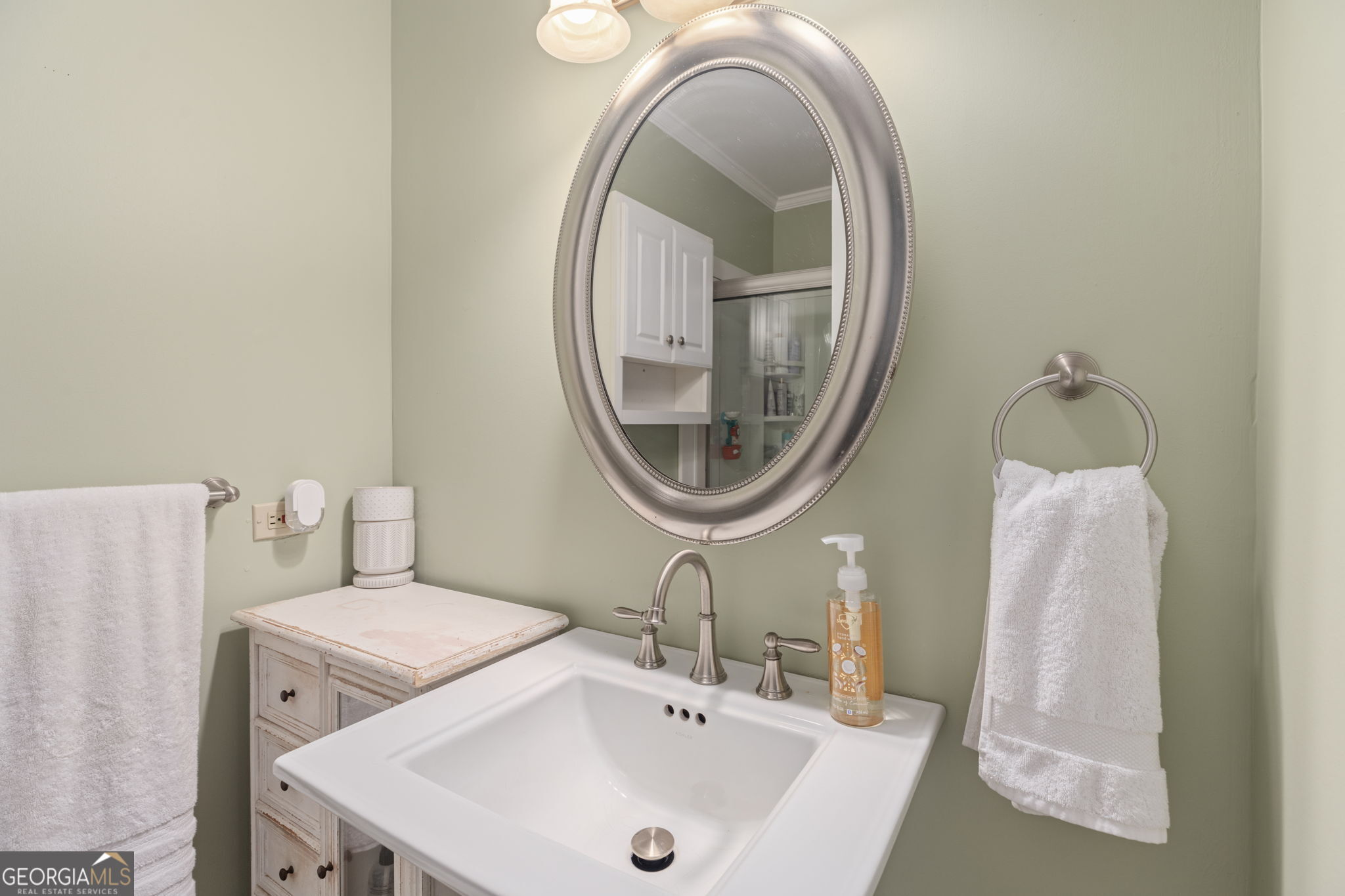 7890 Poplar Springs Road Byromville, GA 31007 - Photo 27 of 74 a bathroom with a sink and a mirror