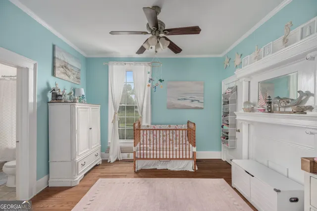 a view of a house with yard and sitting area