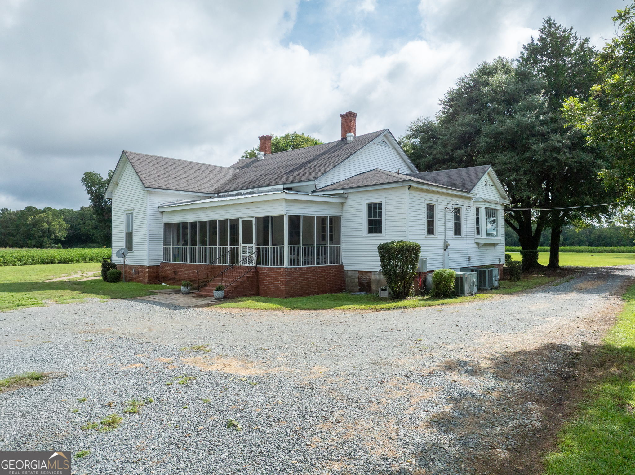 7890 Poplar Springs Road Byromville, GA 31007 - Photo 38 of 74 a view of a house with a yard