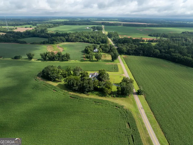 a view of a lake with a yard
