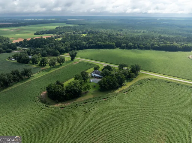 a view of a golf course with a lake