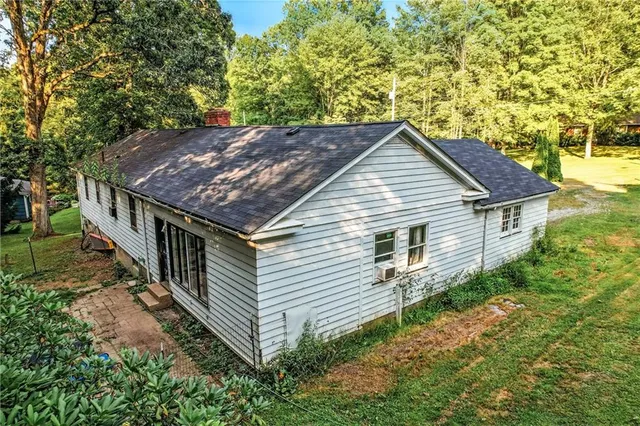 a house view with a backyard space