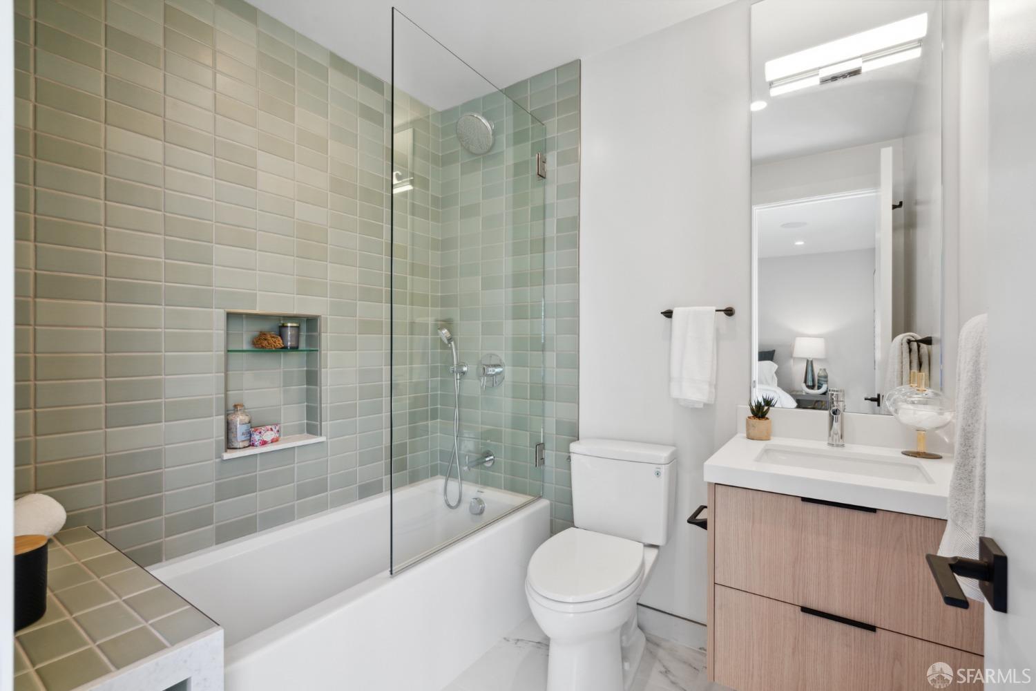 674 Capp Street San Francisco, CA 94110 - Photo 17 of 41 a bathroom with a sink toilet and shower