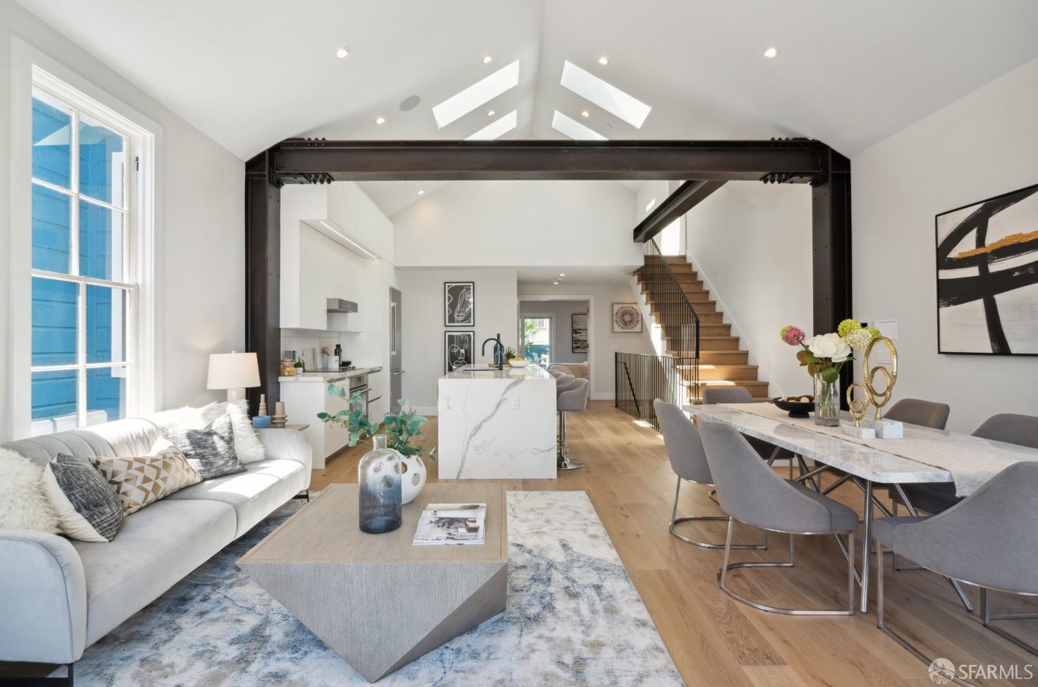 674 Capp Street San Francisco, CA 94110 - Photo 2 of 41 a living room with furniture and a chandelier