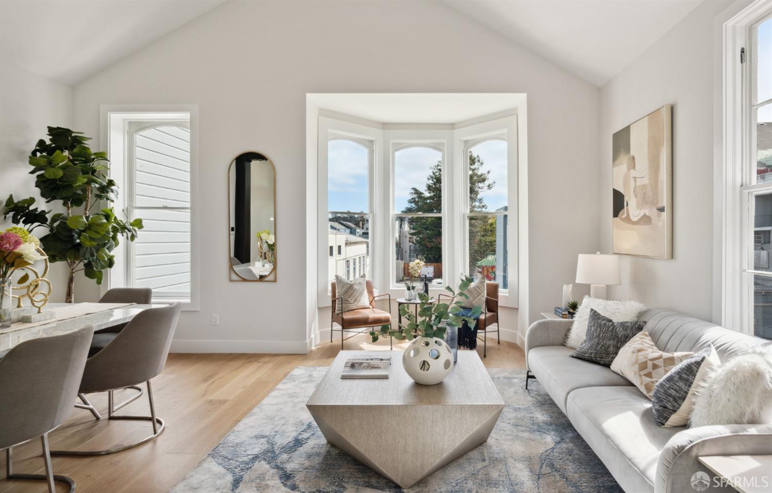 674 Capp Street San Francisco, CA 94110 - Photo 4 of 41 a living room with furniture and a potted plant