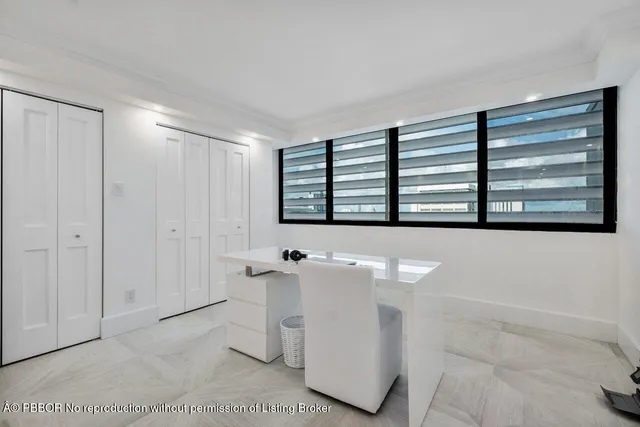 a bathroom with a bathtub a sink and a window