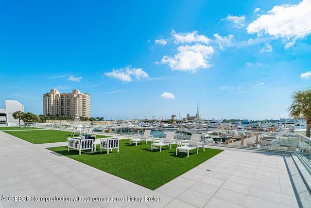 an aerial view of a house with a lake view