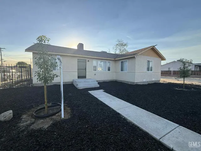 a view of house with outdoor space