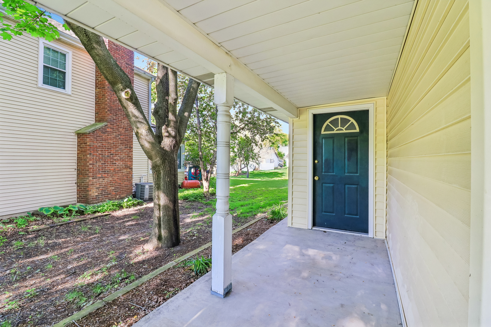 733 Buttonwood Circle Naperville, IL 60540 - Photo 14 of 39 a house view with a backyard space