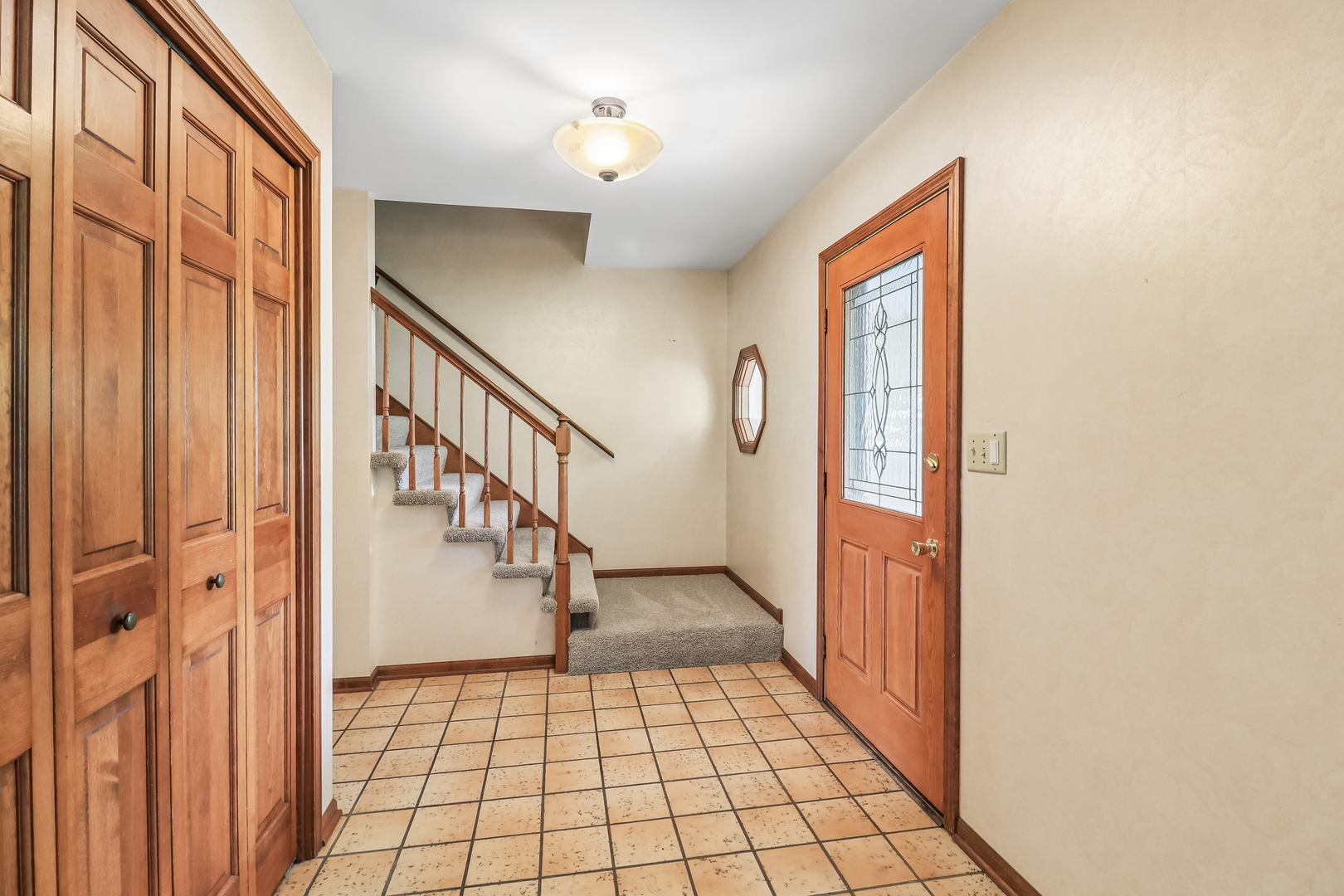 733 Buttonwood Circle Naperville, IL 60540 - Photo 15 of 39 a view of an entryway with staircase