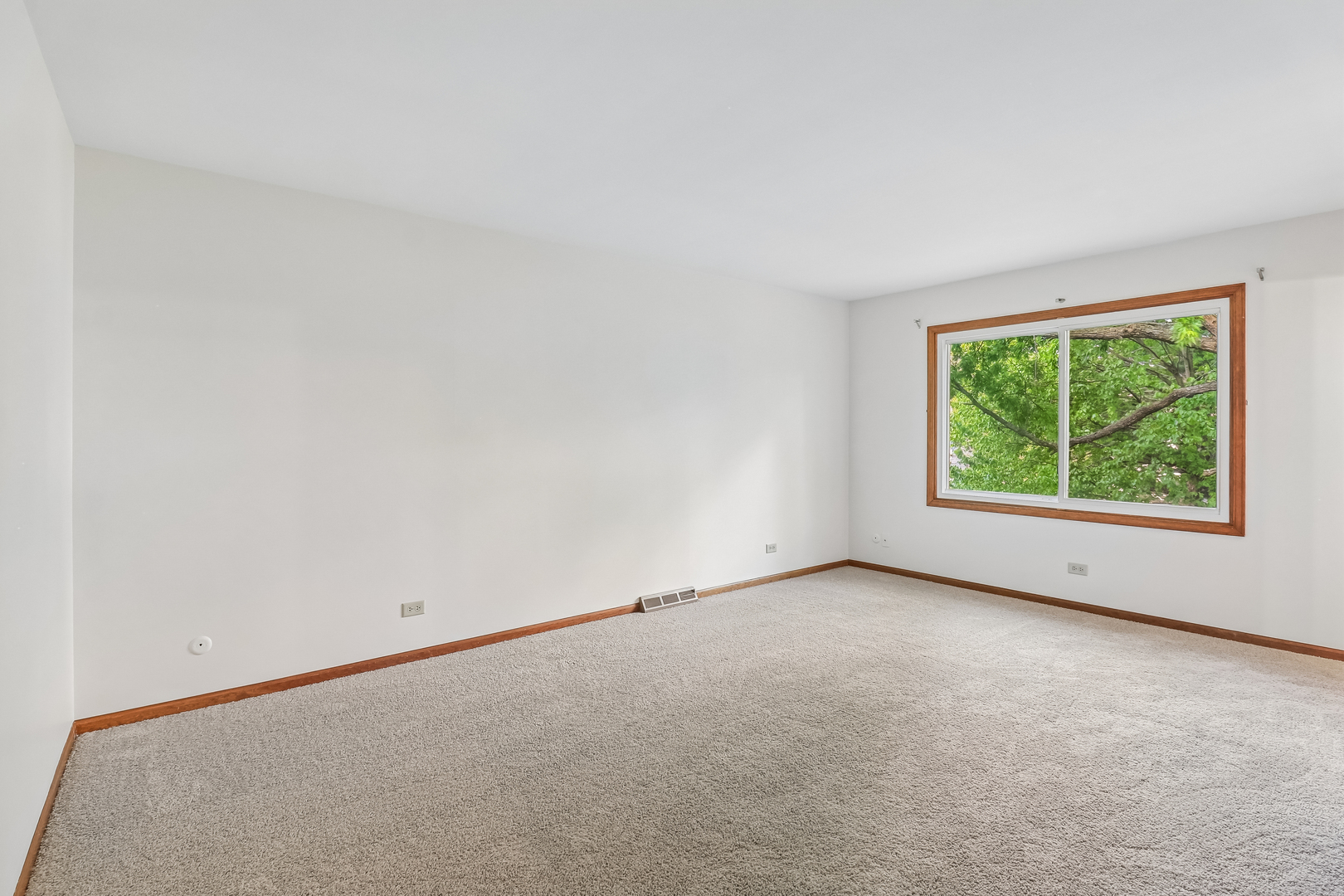 733 Buttonwood Circle Naperville, IL 60540 - Photo 27 of 39 an empty room with a window