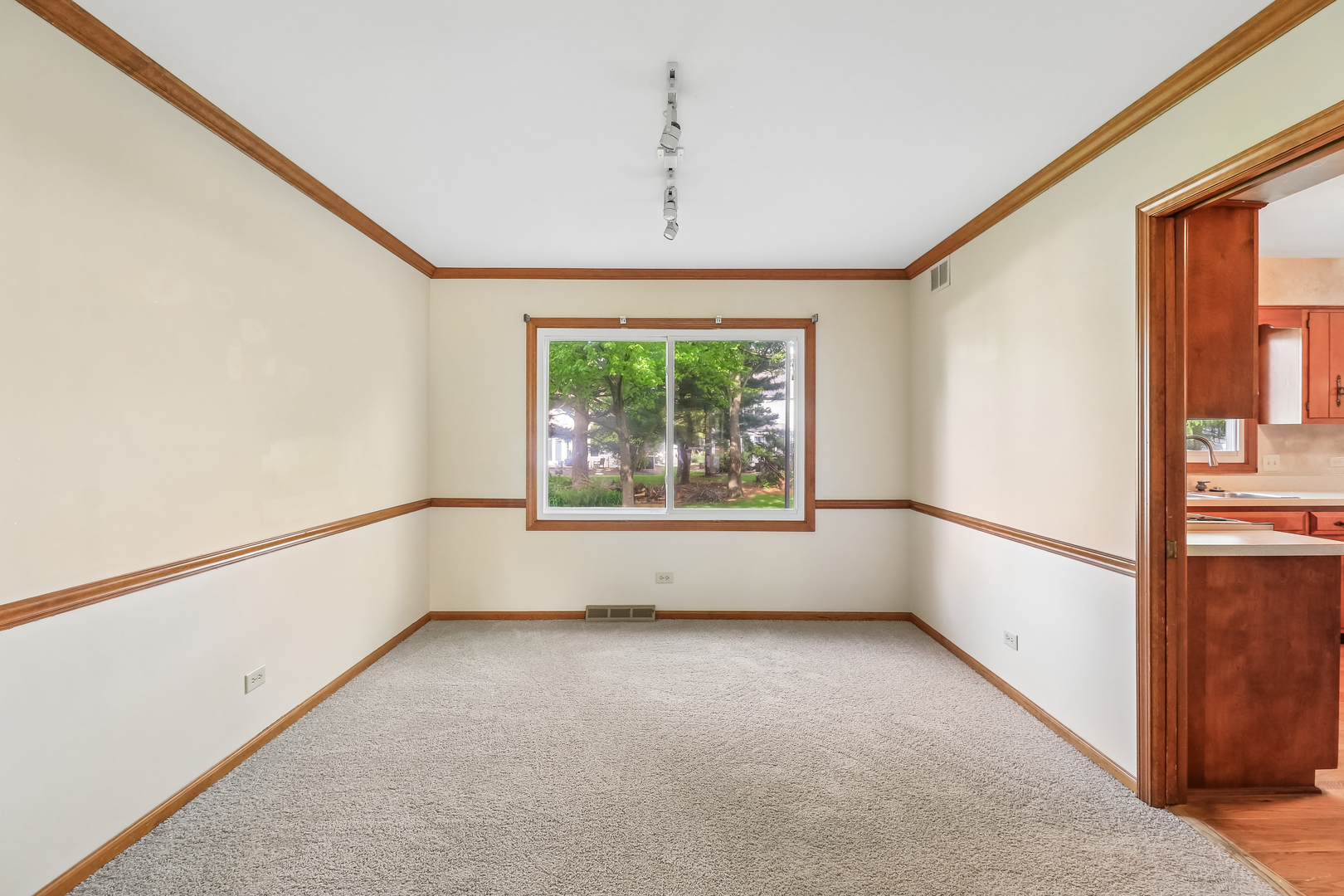 733 Buttonwood Circle Naperville, IL 60540 - Photo 34 of 39 a view of an empty room with a window