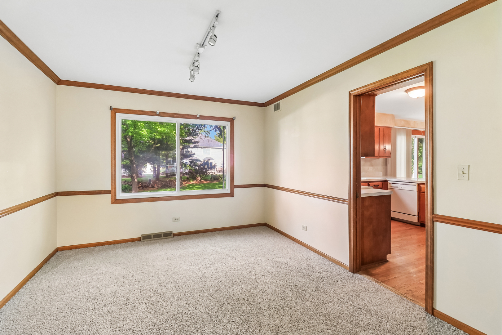 733 Buttonwood Circle Naperville, IL 60540 - Photo 35 of 39 a view of an empty room with a window