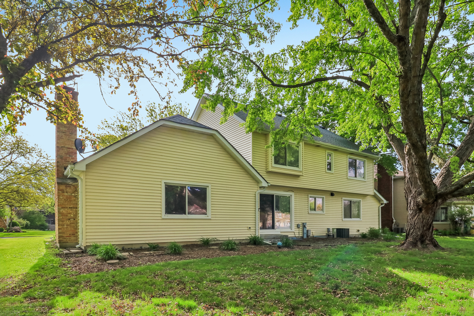 733 Buttonwood Circle Naperville, IL 60540 - Photo 39 of 39 a view of a house with a yard