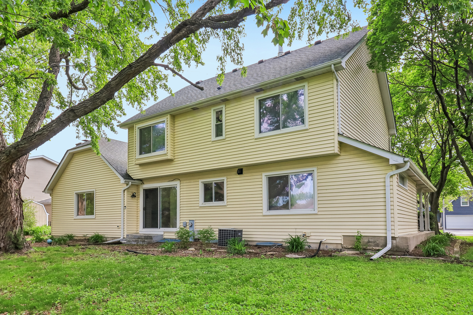 733 Buttonwood Circle Naperville, IL 60540 - Photo 5 of 39 a view of a house with a yard